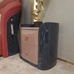 Curved High-Gloss Nightstand with Textured Drawer Panels and Oval Pulls